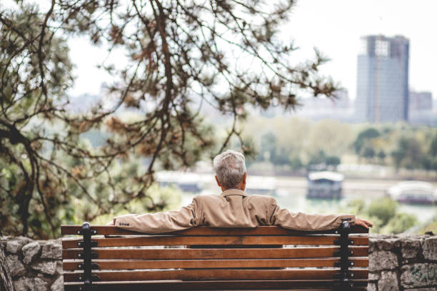 istock Lonely senior man in a pubic park 1179360668