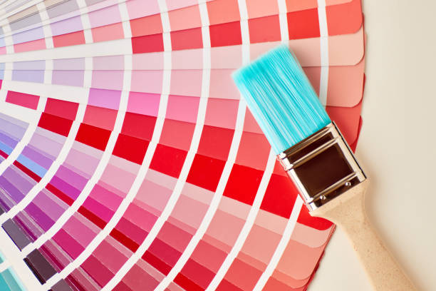 istock Paint bruash and color swatches book 1179362900
