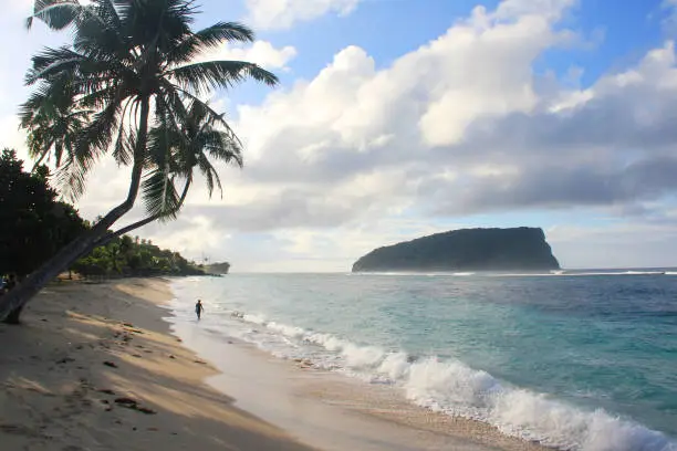 Photo of Sunrise at Lalomanu beach. Voted one of the best beaches in the world and a stunning place to stay, Lalomanu Beach in Samoa is a must-visit beach destination.