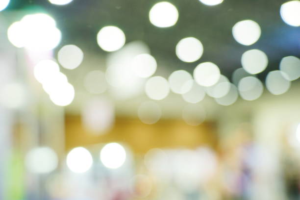 istock Abstract blurred white color background with bokeh light 1179364539