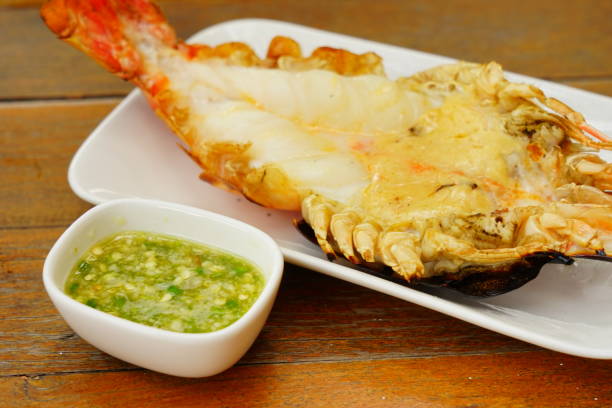 istock Grilled river shrimp River on wood texture background 1179364568
