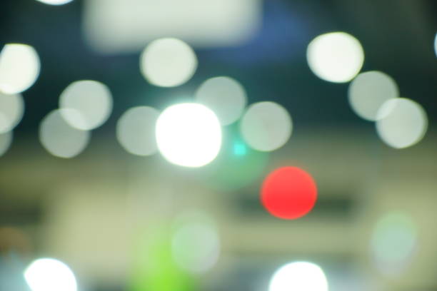 istock Abstract blurred white color background with bokeh light 1179364836