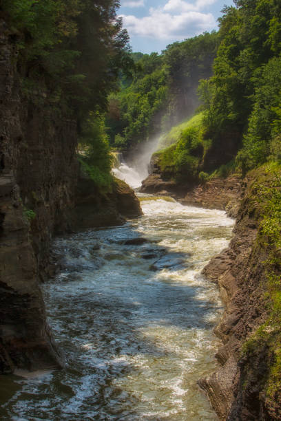 istock A waterfall photographed with a slow-shutter-speed at Letchworth State Park in New York State in the summer. 1179366302