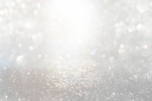 istock abstract backgrounf of glitter vintage lights . silver and white. de-focused 1179367811