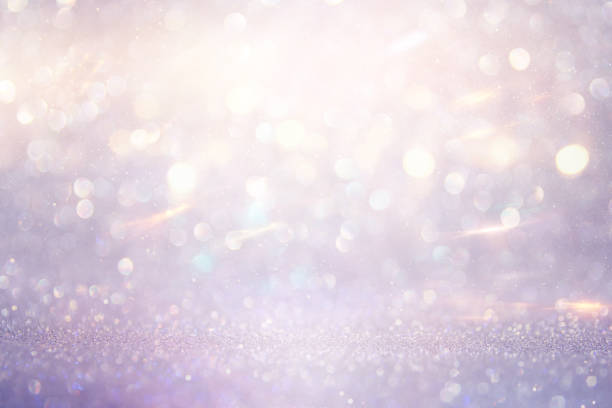 istock abstract glitter pink, purple and gold lights background. de-focused 1179367876