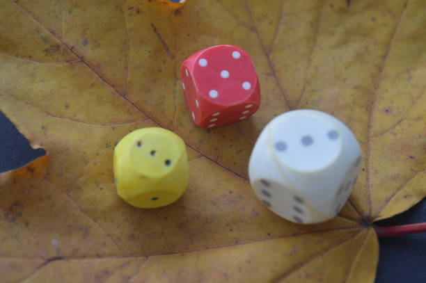 istock Game dice in the composition of different cubes on background 1179371917