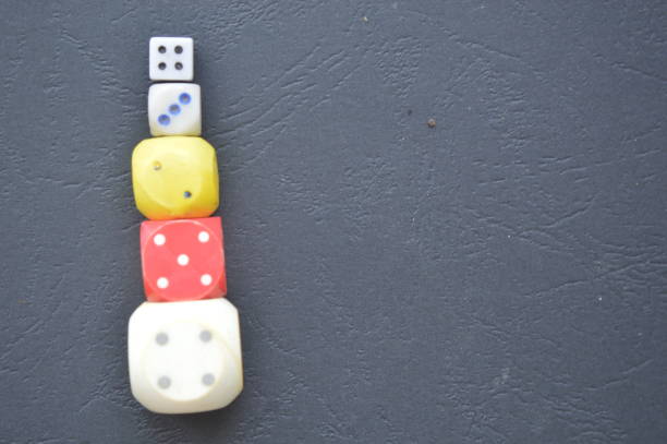 istock Game dice in the composition of different cubes on background 1179372037