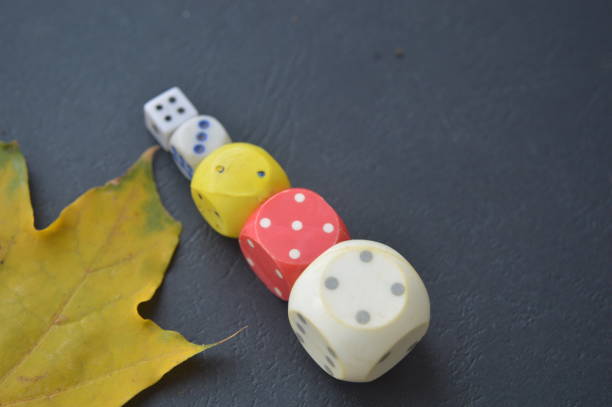 istock Game dice in the composition of different cubes on background 1179372075