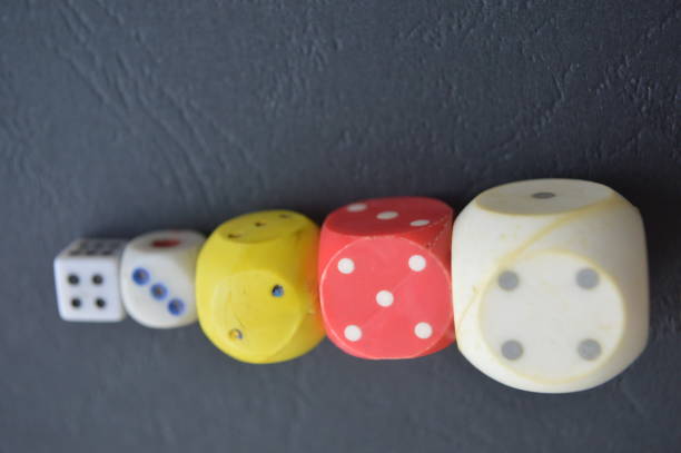 istock Game dice in the composition of different cubes on background 1179372112