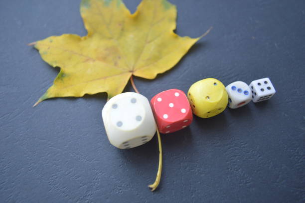istock Game dice in the composition of different cubes on background 1179372205