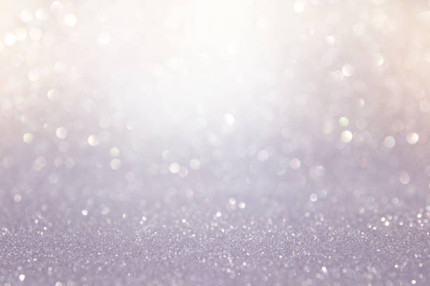 istock abstract backgrounf of glitter vintage lights . silver and white. de-focused 1179372253