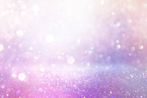 istock abstract glitter pink, purple and gold lights background. de-focused 1179372303