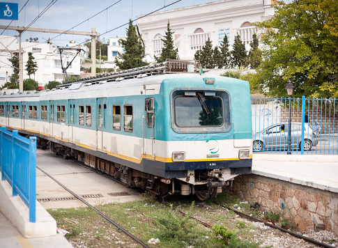 Sousse, Tunisia-17.09.2019: Central metro station of the city, Sousse. The passenger train departs from the station and goes further along the route.