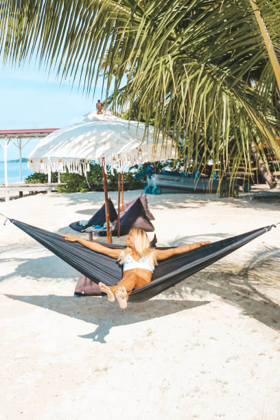istock Woman enjoying in the hammock 1179385101