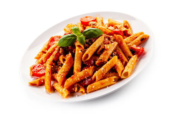 istock Penne with meat, tomato sauce and parmesan on white background 1179386529