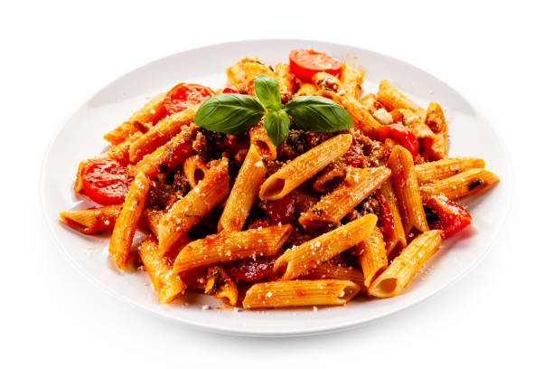 Penne with meat, tomato sauce and parmesan on white background Penne with meat, tomato sauce and parmesan on white background marinara stock pictures, royalty-free photos & images