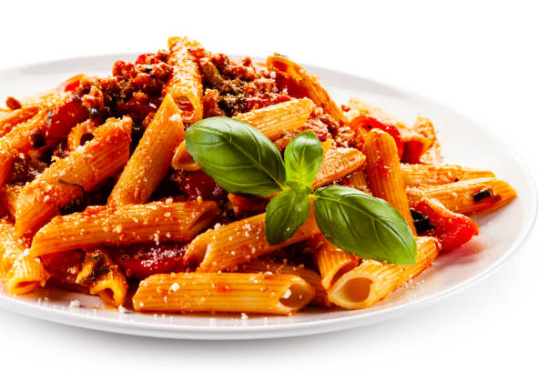 istock Penne with meat, tomato sauce and parmesan on white background 1179386683
