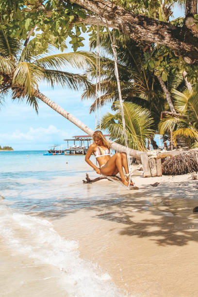 istock Woman sitting on the swing 1179386973