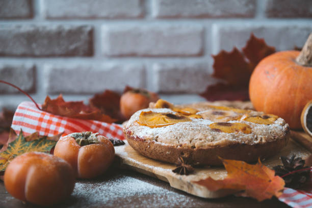 1 autumn homemade cake with persimmon slices and powdered sugar, dissert, 1 autumn homemade cake with persimmon slices and powdered sugar, dissert, dissert stock pictures, royalty-free photos & images