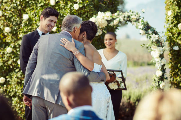 I'm so happy for you honey Shot of a mature man giving his daughter away on her wedding day bride hugging father on wedding day stock pictures, royalty-free photos & images