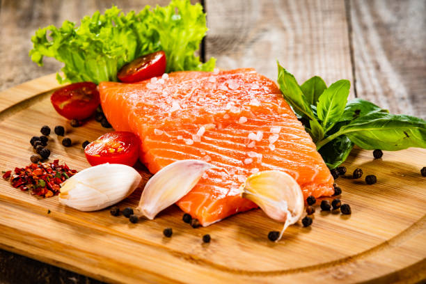 istock Fresh raw salmon steak on cutting board 1179394758