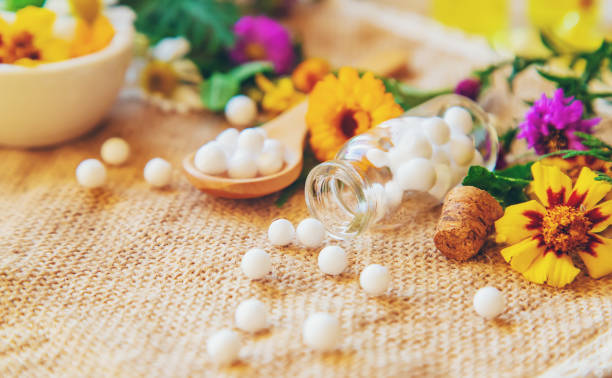 istock Homeopathy. Herbal extracts in small bottles. Selective focus. 1179395294