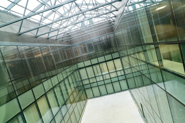 istock Glass office room with panoramic windows. Unused, free space, prepared for meditative garden. Modern business center 1179398915