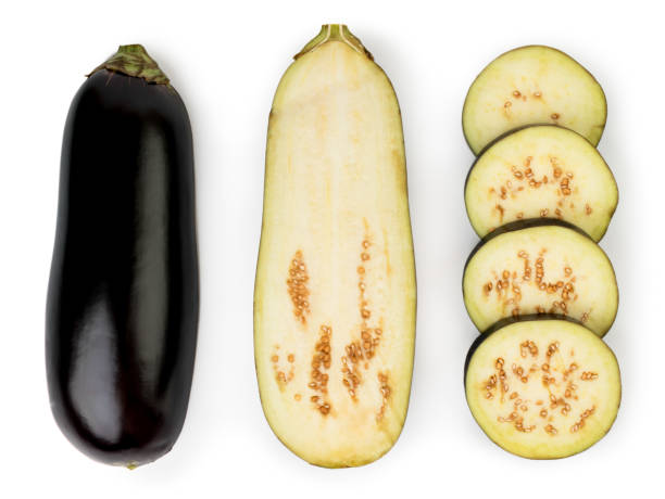 istock Eggplant isolated on white background. Eggplant, halved eggplant, aubergine ring top view. 1179399704