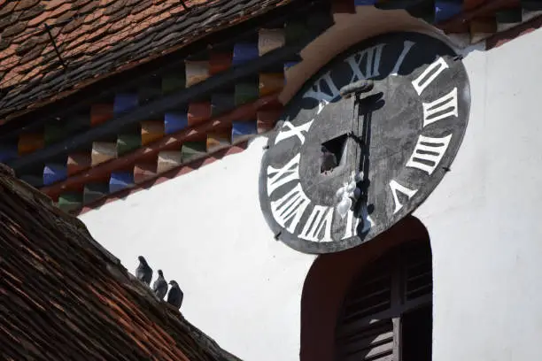 Old clock tower in a church from Saliste Romania
