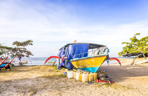 Colorful traditional fishing boat on balinese shore, Indonesia