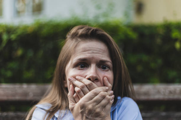 istock Scared woman covering her mouth 1179400293