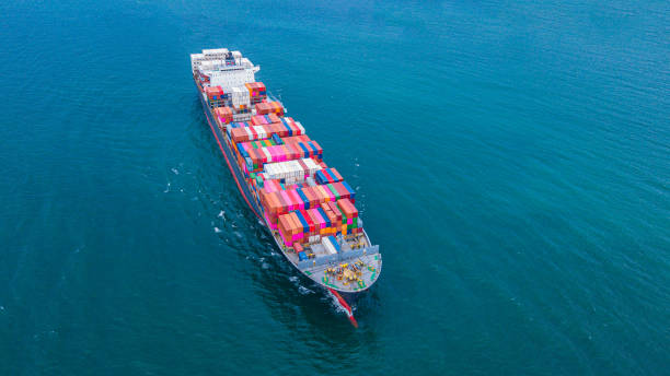 istock Cargo ships with full container receipts to import and export products worldwide 1179403020
