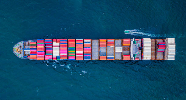 istock Cargo ships with full container receipts to import and export products worldwide 1179403039