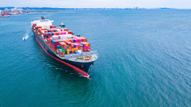 istock Cargo ships with full container receipts to import and export products worldwide 1179403040