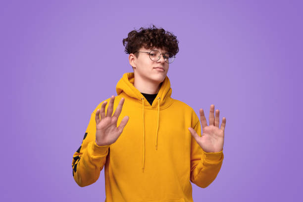 istock Confused teen boy gesturing rejection 1179404601