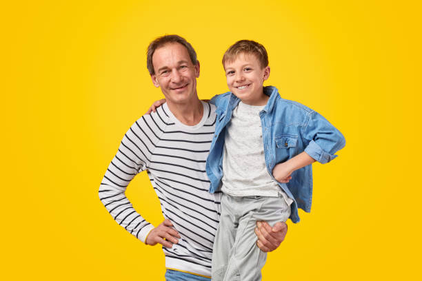 istock Happy grandfather with cheerful boy 1179404712