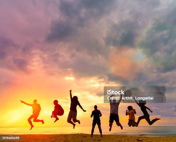 Silhouette Happy Family People Group Celebrate Jump For Good Life On Weekend Concept For Win Victory Person Faith In Financial Freedom Healthy Wellness Great Insurance Team Support Retreat Together In Summer Stock Photo - Download Image Now
