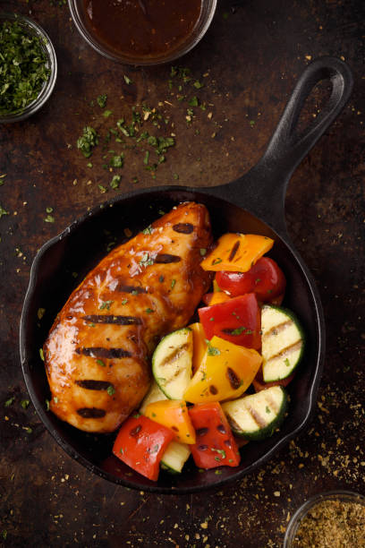 istock Barbecue grilled chicken breast and vegetables 1179405557