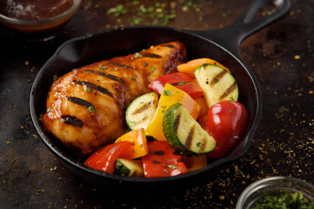 istock Barbecue grilled chicken breast and vegetables 1179406334