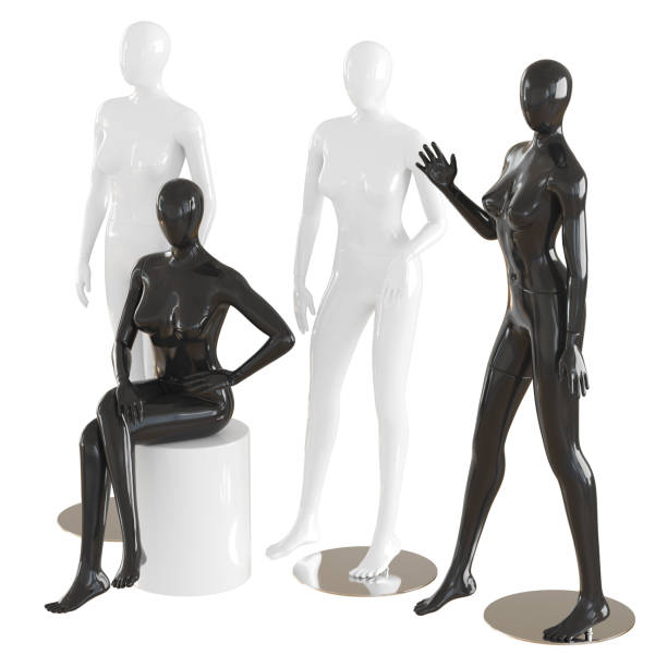 istock Three female mannequins stand and one sits on an isolated background .3d rendering 1179406746