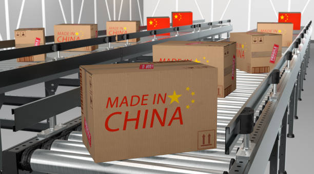 istock cardboard packages Made in Cina on conveyor 1179406994