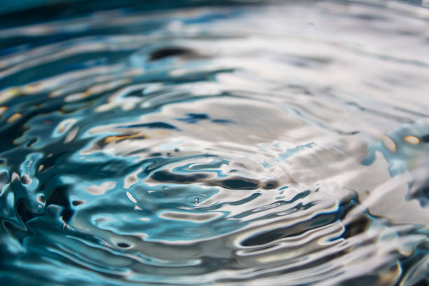 istock Water splash or drop. Water splash close-up. Blue water drop. Falling water 1179408469