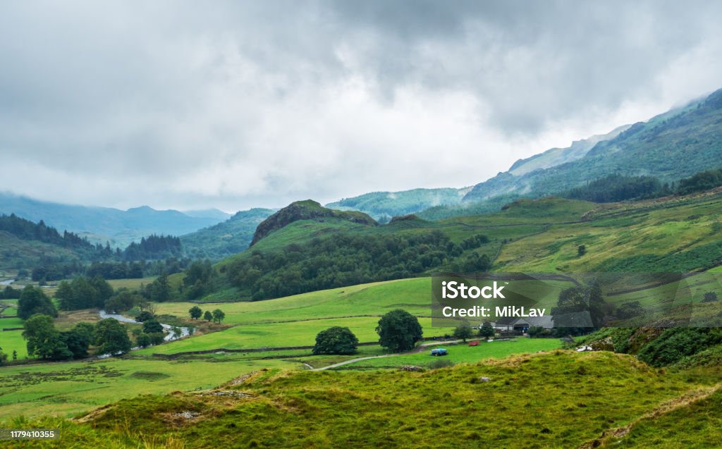 View on a Eskdale valley View on a Eskdale mountain valley near Hardknott Pass in the Lake District National Park; Cumbria; England. Cloud - Sky Stock Photo