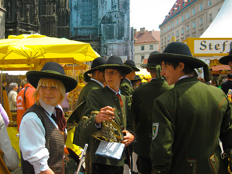 Vienna, Austria - May 22, 2010: Young musicians in national uniforms near St. Stephen's Cathedral