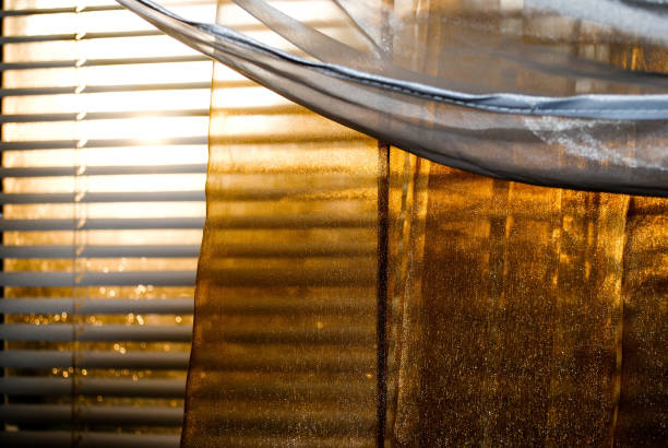 istock Sunlight penetrates through the blinds and curtains 1179414915