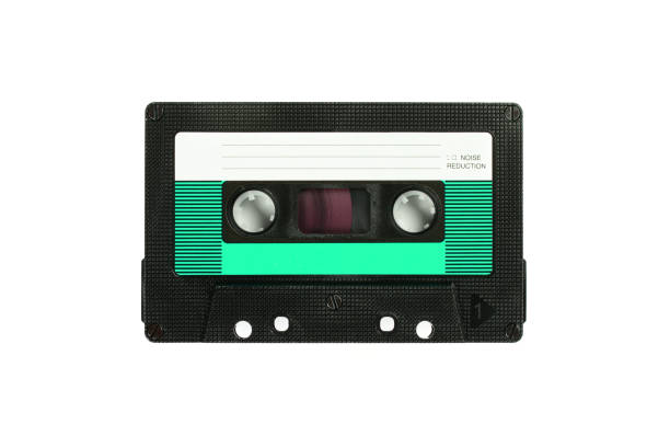 istock Audio compact cassette. Analog tape format for audio playing and recording. Green audio cassette isolated on white background. 1179417163