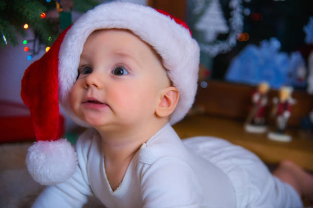 istock Baby Boy Wearing Santa Hat 1179418826