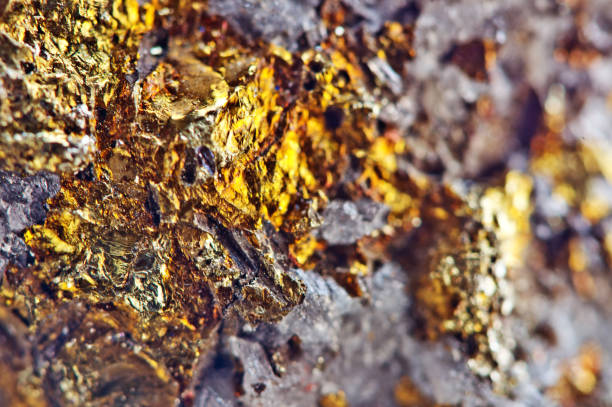 istock Golden background. Nugget, colour metal. Beautiful structure. Macro. 1179418839