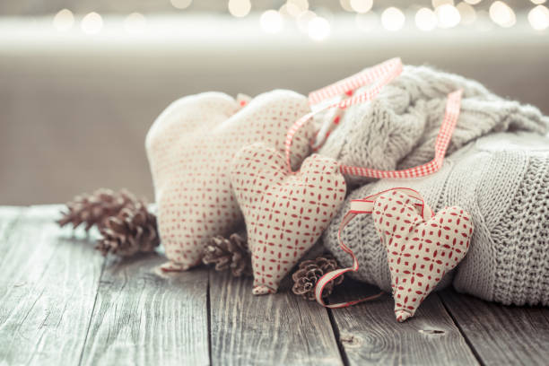 istock Cozy background on a wooden background with decorative objects hearts 1179420133