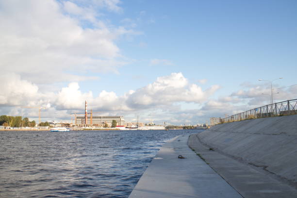istock Granite embankment along the river on a sunny day 1179421203